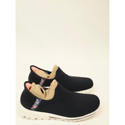 Skechers Go Walk Travel Tahiti Sunsumet Slip-On Knit Sneakers in Black