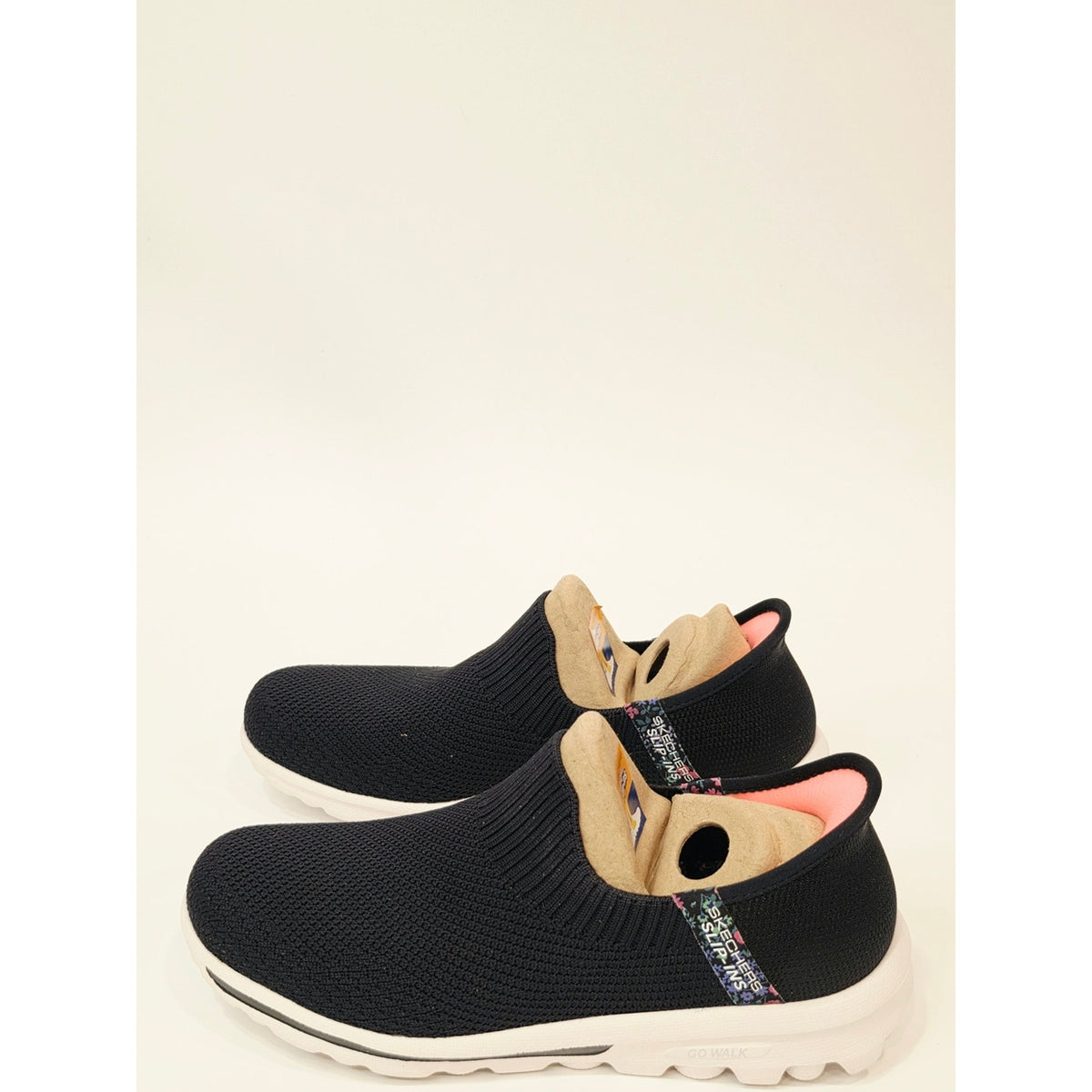 Skechers Go Walk Travel Tahiti Sunsumet Slip-On Knit Sneakers in Black