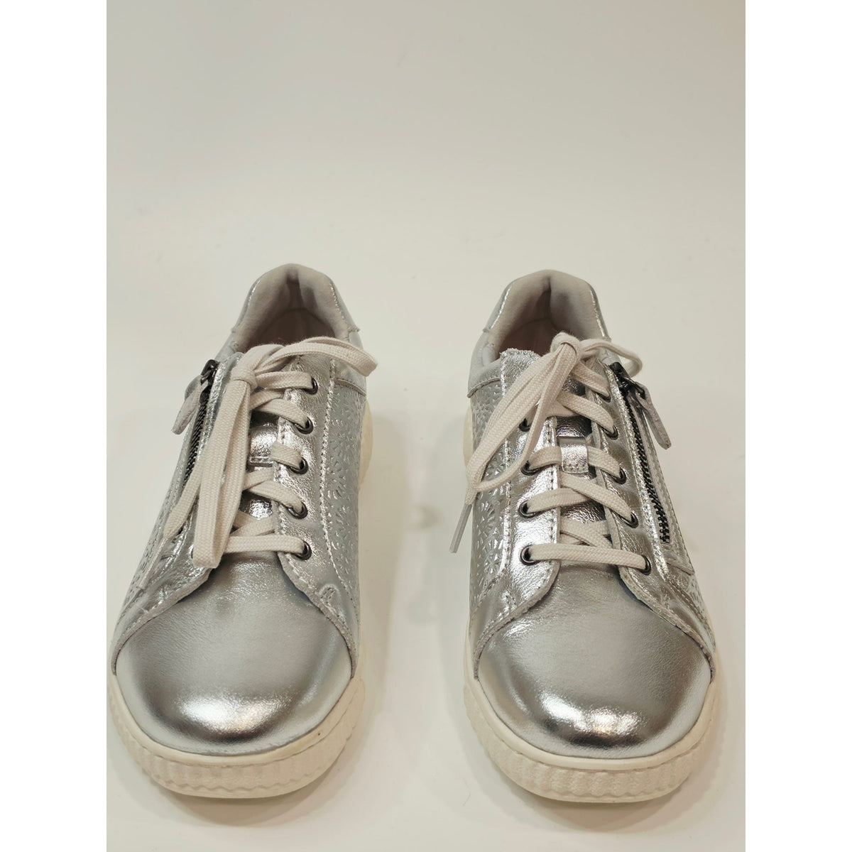 Clarks Collection Caroline Rio leather sneakers in a silver metallic finish