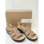 Clarks Lexi Marigold Q Sandals in a beige snake-print leather finish