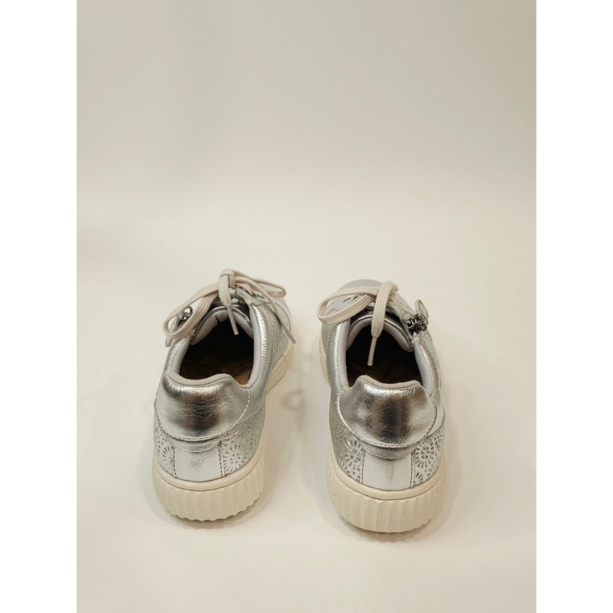 Clarks Collection Caroline Rio leather sneakers in a silver metallic finish