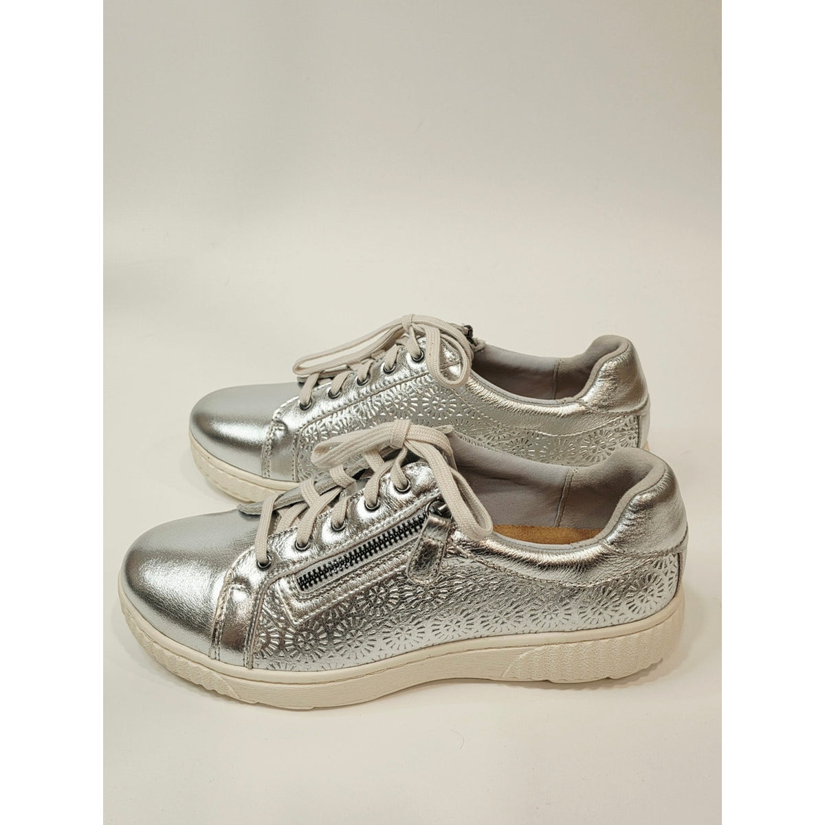 Clarks Collection Caroline Rio leather sneakers in a silver metallic finish