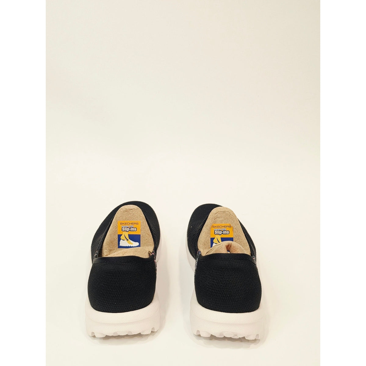 Skechers Go Walk Travel Tahiti Sunsumet Slip-On Knit Sneakers in Black